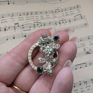 Elegant Silver and Green Floral Brooch
